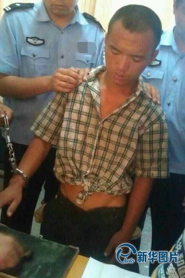2013年8月20日午間，河南省安陽警方將“8.19公交搶劫案”嫌犯24歲的周江波緝拿歸案。圖片來