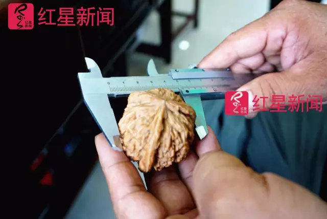 文玩核桃遇冷由幾萬(wàn)一對(duì)降到5元沒(méi)人要？商戶否認(rèn)